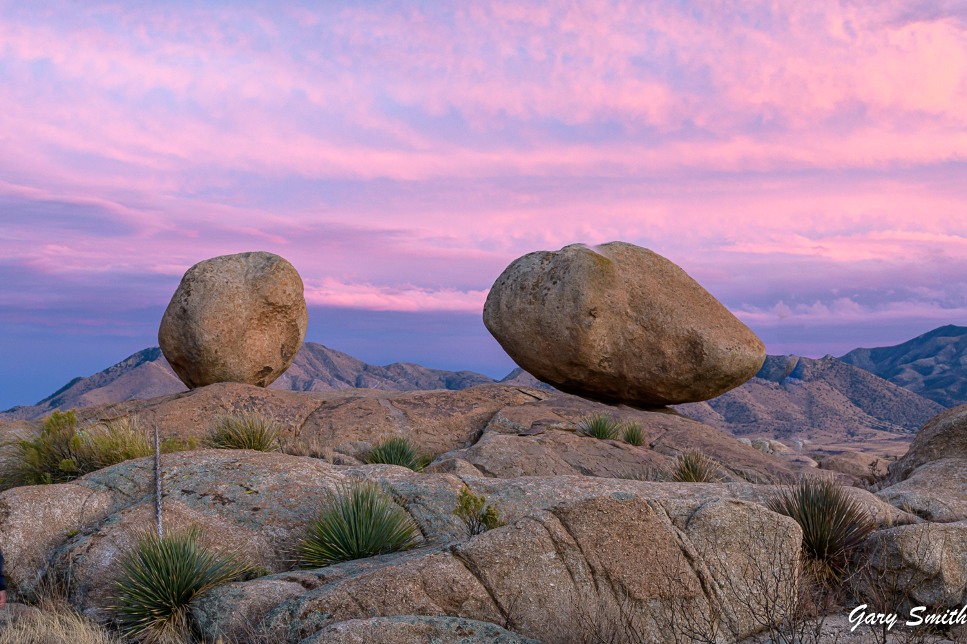 Balancing granite boulders at sunrise at the Amerind Museum Campus