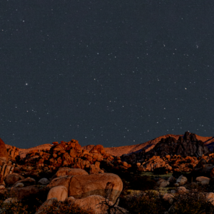 The boulders of Texas Canyon in the foreground with a starry filled sky above